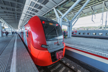 Sochi, Russia - April 16, 2021: Passenger trains stand by the station platform of Imeretian resortのeditorial素材