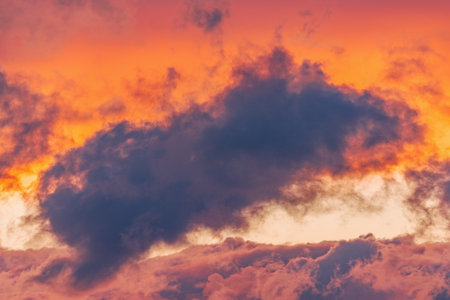 Amazing cloudscape on the sky at sunset time after rainの写真素材
