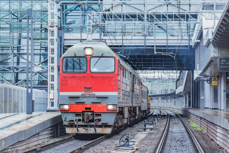 Sochi, Russia - April 10, 2021: Train arrives to the Adler station platform.のeditorial素材