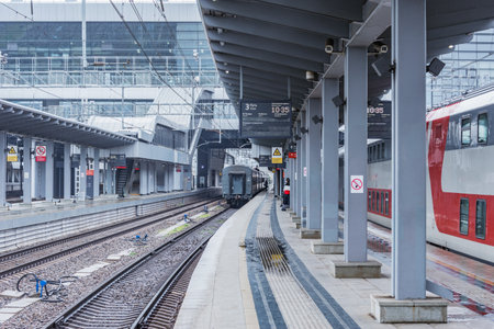 Sochi, Russia - April 10, 2021: Passenger train stands by the Adler station platform.のeditorial素材