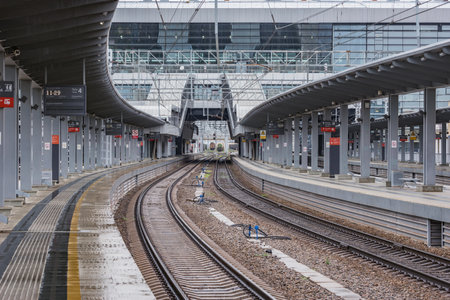 Sochi, Russia - April 10, 2021: Passenger platforms of Adler station at rainy day.のeditorial素材