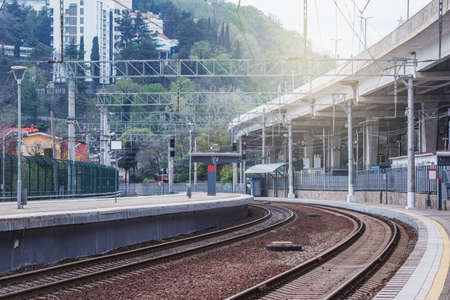 Passenger platforms of Khosta station at sunset. Sochi.の写真素材