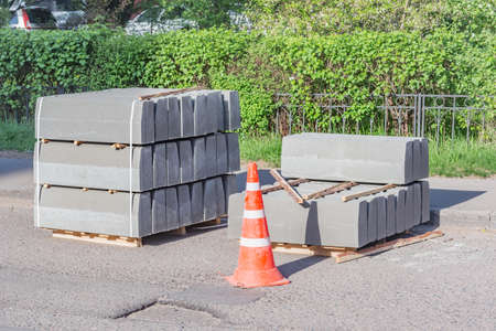 Border stones on the pallet by the construction site.の写真素材