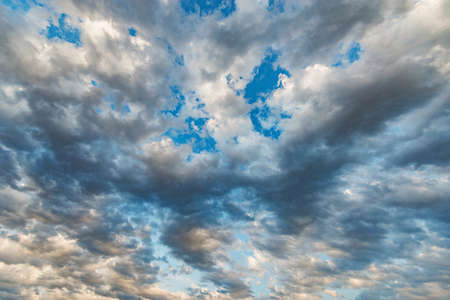 Amazing cloudscape on the sky at sunset time after rainの写真素材