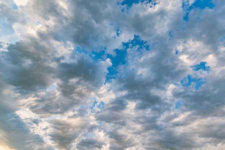 Amazing cloudscape on the sky at sunset time after rainの写真素材