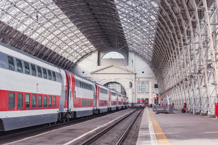 Moscow, Russia - May 30, 2021: Passenger train stands by the platform before boarding.のeditorial素材