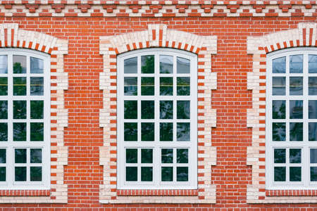 Three closed windows of the retro building.の写真素材