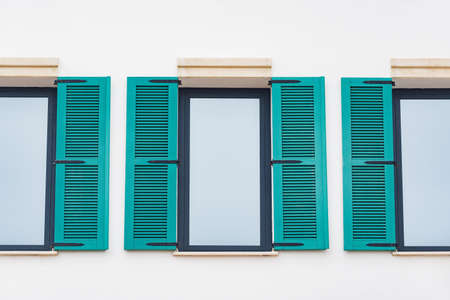 Windows with shutters of the new private house.の写真素材