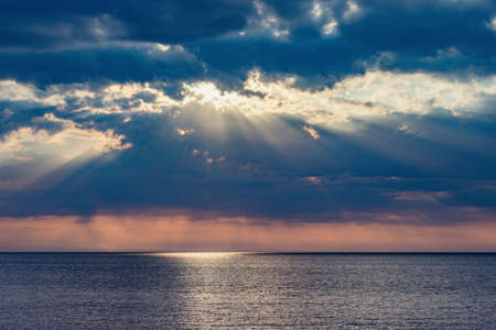 Sunset view of the sea coast at summer time.の写真素材