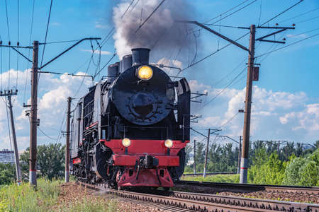 Retro train moves at day time. Moscow. Russia.の写真素材