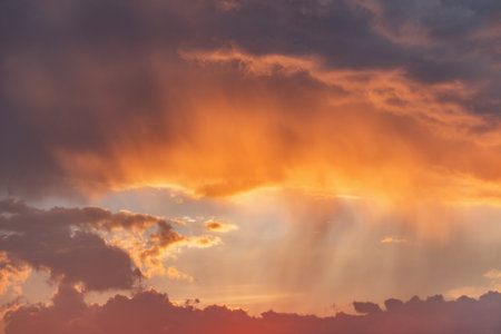Amazing cloudscape on the sky at sunset time after rain.の写真素材