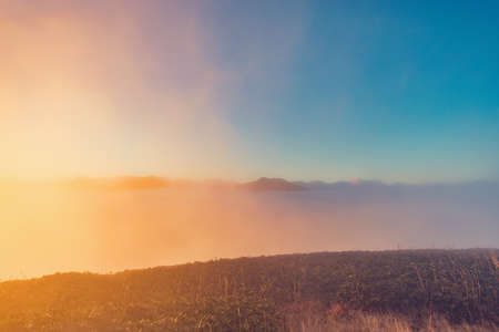 Clouds above the mountains at sunset. Caucasus. Russia.の写真素材