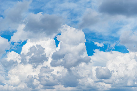 Stormy clouds on the blue sky. Cloudscape at day time.の写真素材