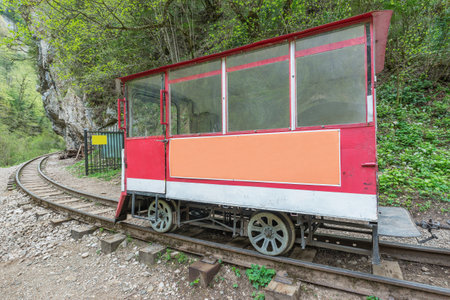Railcar for the track workers in the deep narrow Guam canyon. Western Caucasus. Russia.の写真素材