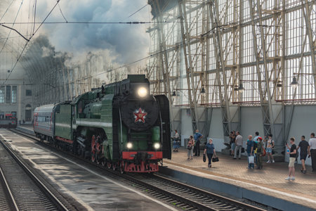 Retro train arrives to the platform.のeditorial素材