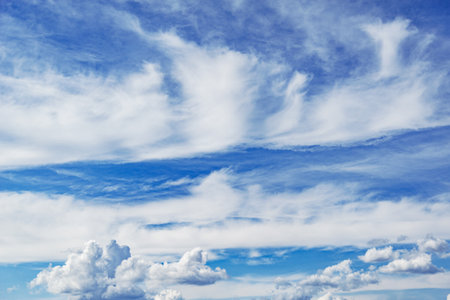 Small clouds on the blue sky. Cloudscape at day time.の写真素材