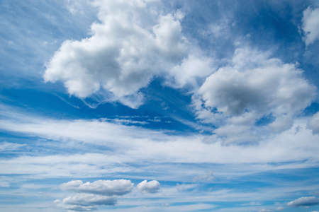 Small clouds on the blue sky. Cloudscape at day time.の写真素材