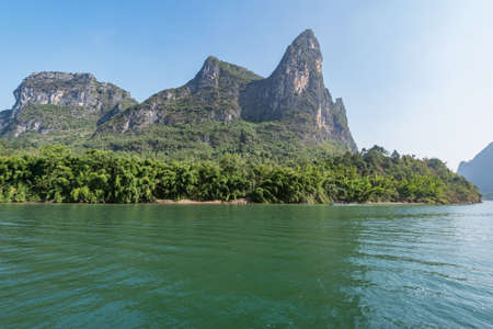 Day view of karst hills by Li River. China.の写真素材