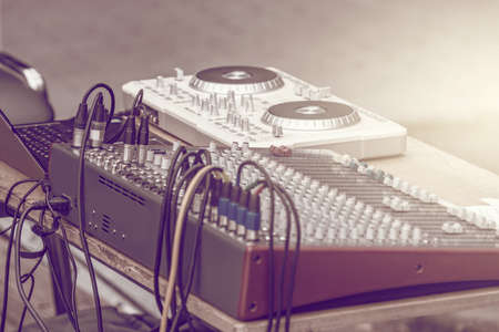 DJ mixer controller panel for playing music and partying.の写真素材