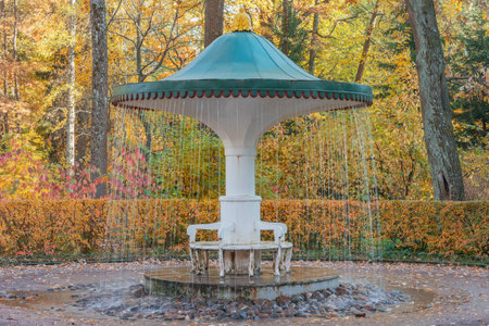 Petergof, Saint Petersburg, Russia - October 04, 2021: Fountain inside of the autumn park.のeditorial素材