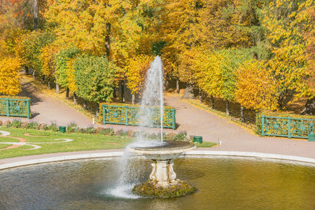 Peterhof, Saint Petersburg, Russia - October 04, 2021: Fountain in the Lower Park of Peterhof at autumn time.のeditorial素材