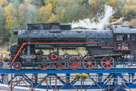 Retro steam locomotive at the turning circle. Ruskeala Mountain Park railway station.のeditorial素材