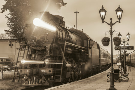 Sortavala, Russia - October 01, 2021: Retro steam train arrives from Ruskeala Mountain Park.のeditorial素材