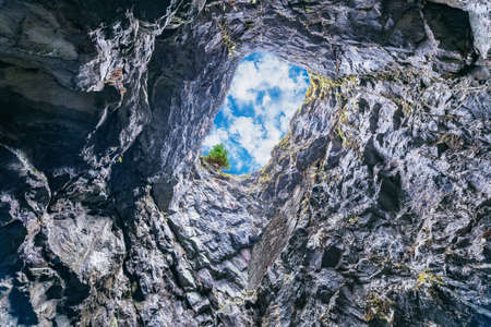 Hole in the cave of the mountain. Russia.の写真素材