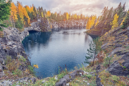 Lake in the deep marble canyon. Ruskeala Mountain Park at sunset. Republic of Karelia. Russia.の写真素材