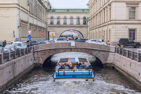 Saint Petersburg, Russia - October 05, 2021: Boat with tourists moves from Moyka to Neva river.のeditorial素材