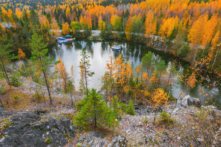Aerial view of Henri Louis Auguste Ricard de Montferrand lake at autumn evening. Ruskeala Mountain Park. Republic of Karelia. Russia.の写真素材