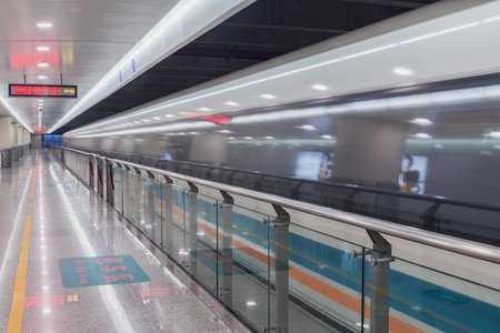 Shanghai, China - January 02, 2017: Shanghai Transrapid Maglev magnetic levitation train departs. It is the first commercial high-speed maglev with cruising speed of 431 km per hour.のeditorial素材