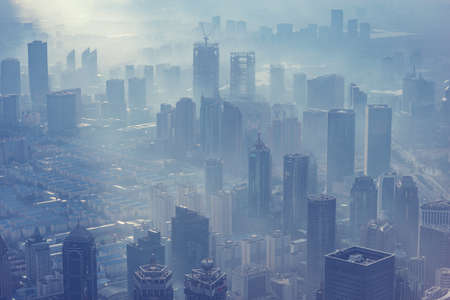 Dusty and dirty air above the city center at morning time. Shanghai. China.の写真素材