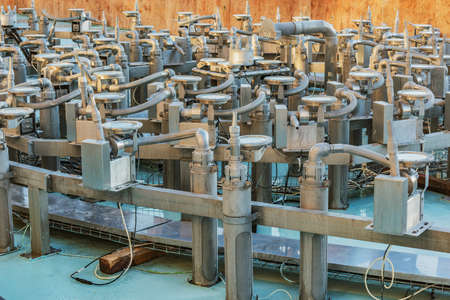 Equipment for water and lanterns inside of the fountain.の写真素材