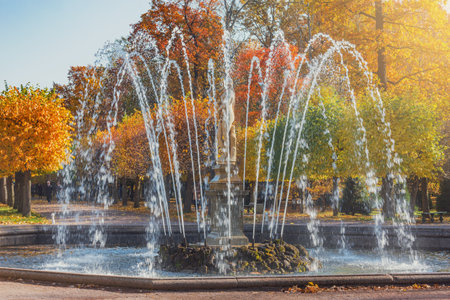 Peterhof, Saint Petersburg, Russia - October 04, 2021: Fountain in the Lower Park of Peterhof at autumn time.のeditorial素材