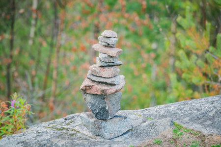 Tower of stones on the edge of the rock.