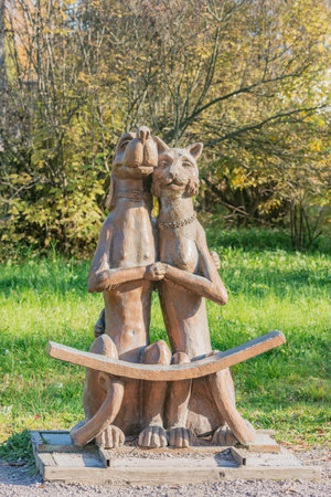 Sortavala, Russia - October 03, 2021: Dog and cat statue in the city park.のeditorial素材