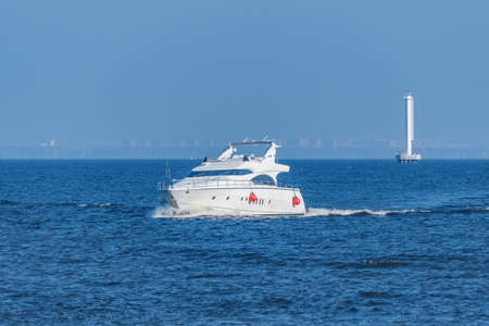 Yacht in the open sea at summer day.の写真素材
