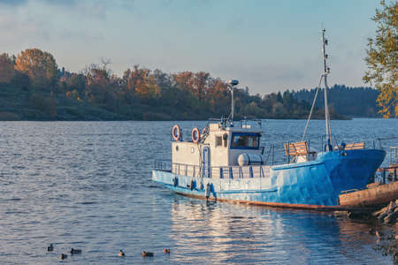 Ship for the nature watching. Lake Ladoga at autumn evening. Republic of Karelia. Russia.の写真素材