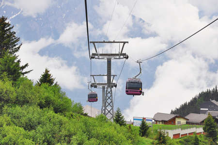 Cableway of the ski resort at foggy day.の写真素材