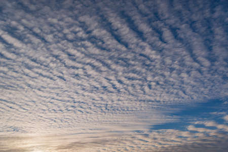 Amazing cloudscape on the sky at sunset time after rain.の写真素材
