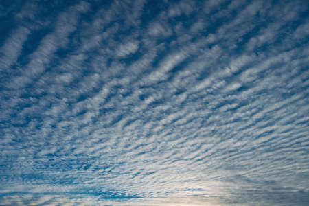 Amazing cloudscape on the sky at sunset time after rain.の写真素材