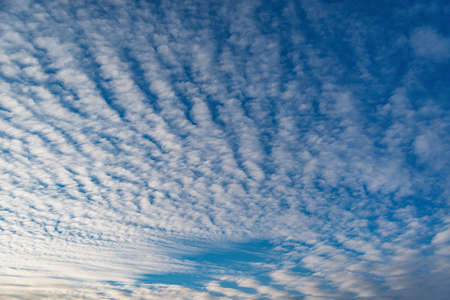 Amazing cloudscape on the sky at sunset time after rain.の写真素材