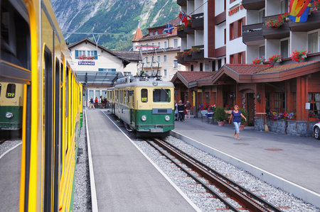 Grindelwald, Switzerland - July 09, 2010: Passenger train arrives to the platform.のeditorial素材