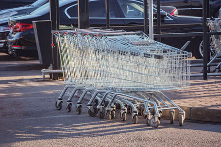 Shopping carts on the street by the supermarket.の写真素材