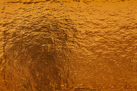 Close up of the golden colored metal backgroundの写真素材