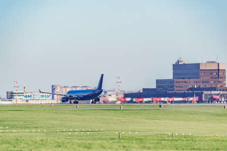 Passenger plane in the airport before the taking off.の写真素材