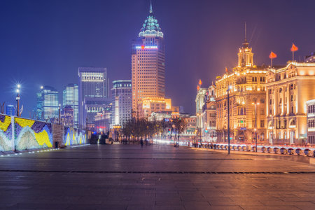 Shanghai, China - December 29, 2016: The Bund, a waterfront area on the western bank of the Huangpu...