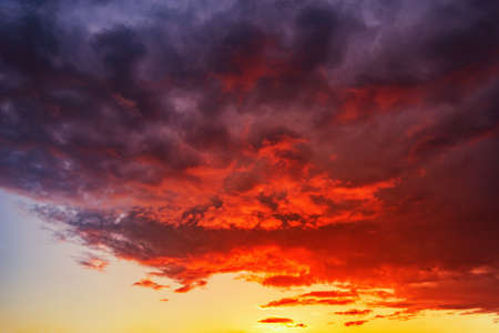 Amazing cloudscape on the sky at sunset time after rain.の写真素材