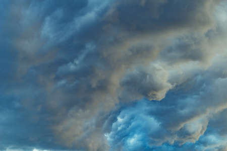 Amazing cloudscape on the sky at sunset time after rain.
